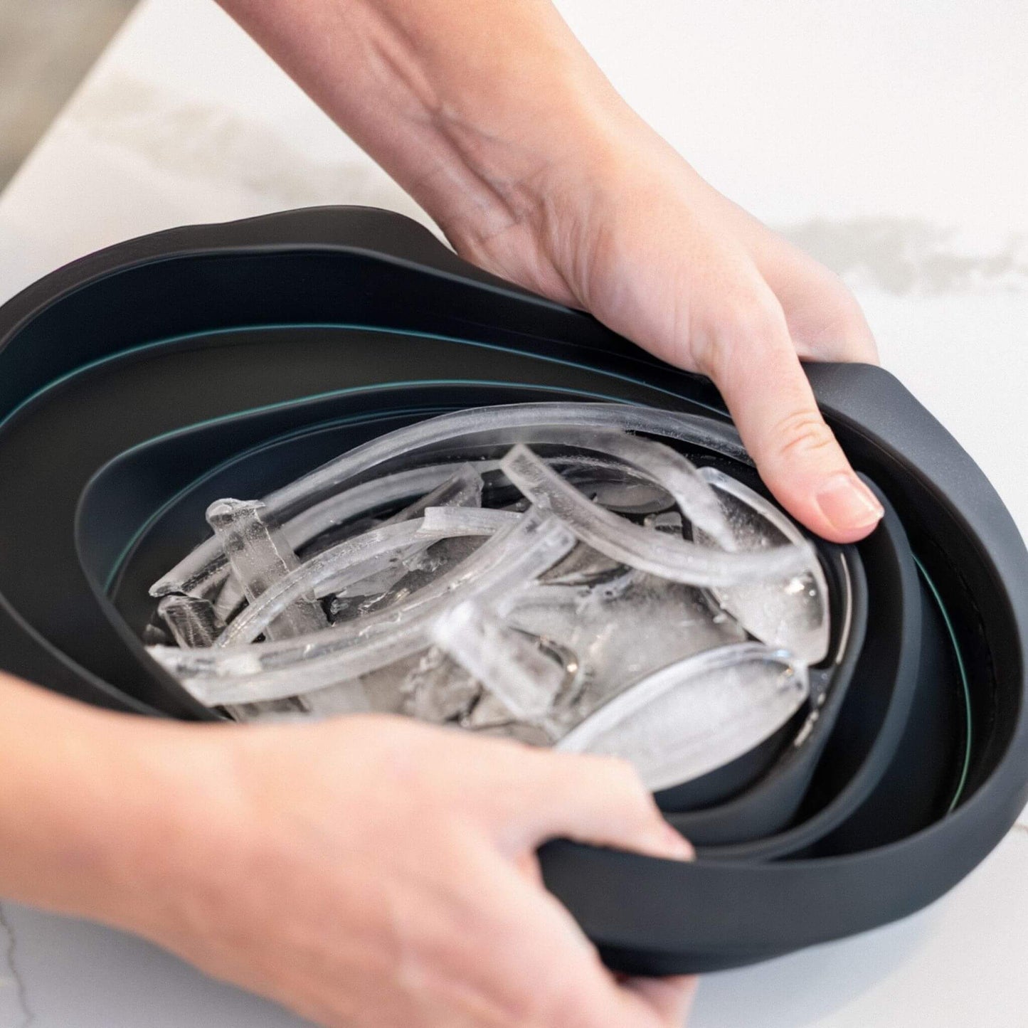 Close-up of fresh ice inside the face dunk bowl after tray is popped out.